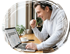 Content marketer reviewing a reactive marketing funnel diagram on a laptop while working at a desk