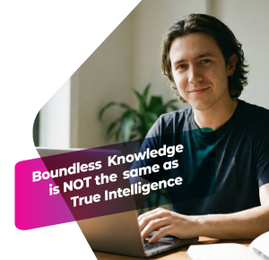 Person working on a laptop representing the contrast between AI knowledge and human intelligence